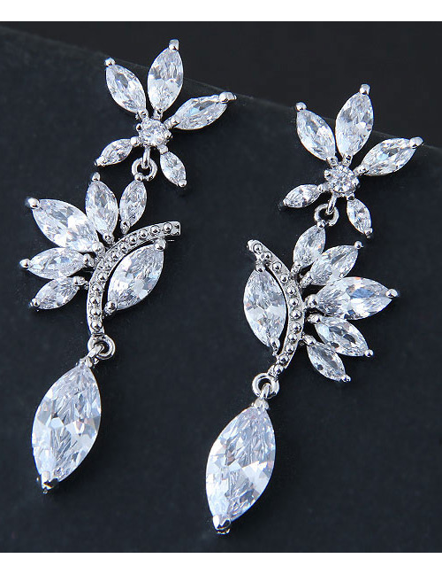 Elegant White Oval Shape Diamond Decorated Earrings