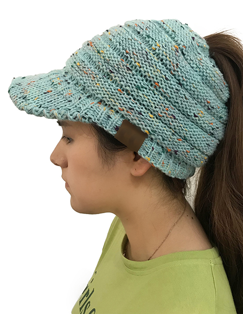 Fashion Blue Label Decorated Hollow Out Knitted Hat