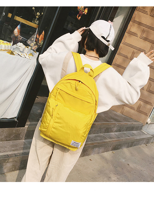 Elegant Yellow Label Decorated Pure Color Backpack