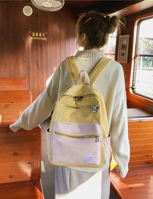 Fashion Yellow Color Matching Decorated Backpack