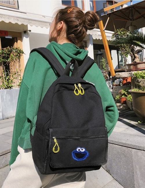Fashion Black Cartoon Pattern Design Pure Color Backpack