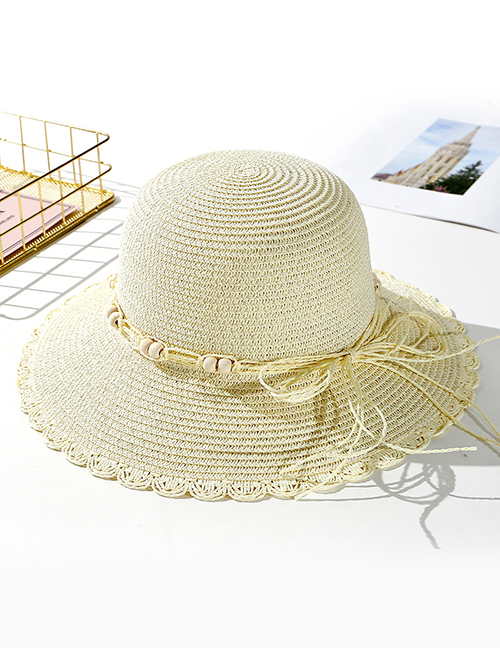 Fashion Creamy-white Wearing A Sun Hat
