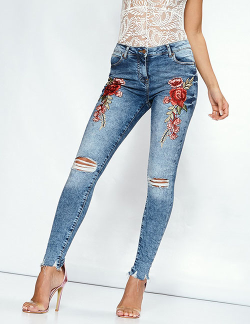 Fashion Light Blue Shredded Embroidery Jeans