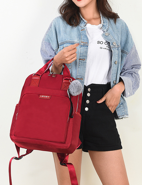 Fashion Red Send Pendant Stitching Hair Ball Backpack