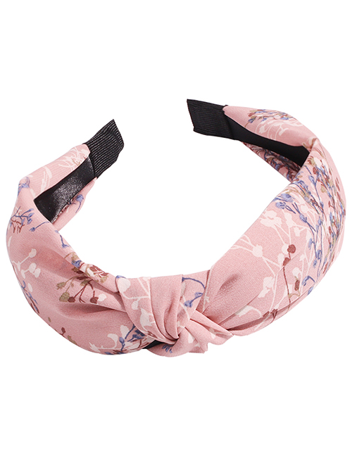 Fashion Pink Knotted Headband In The Middle Of Fabric Printing