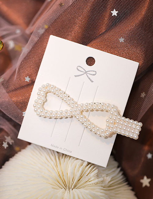 Fashion White Hand Woven String Pearl Bow Hollow Hair Clip