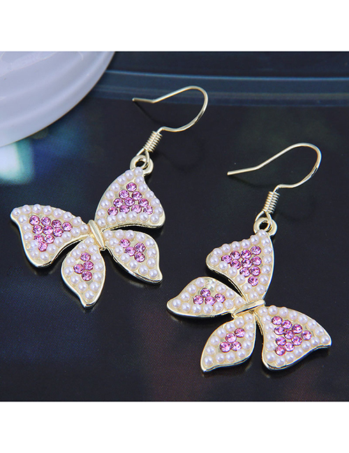 Fashion Pink Diamond Alloy Diamond Pearl Bow Earrings
