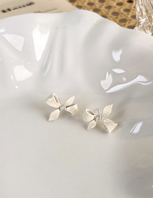 Fashion A White Alloy Spray Paint Bow Stud Earrings