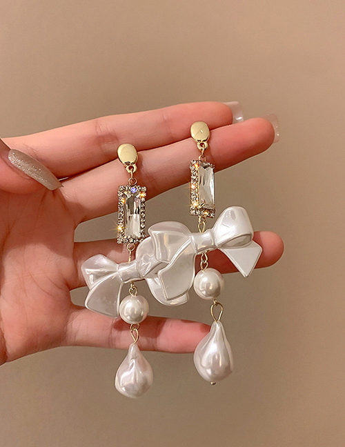 Fashion White Pearl And Diamond Bow Earrings