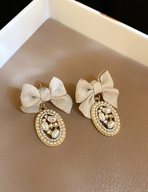 Fashion White Alloy Diamond Pearl Bow Earrings