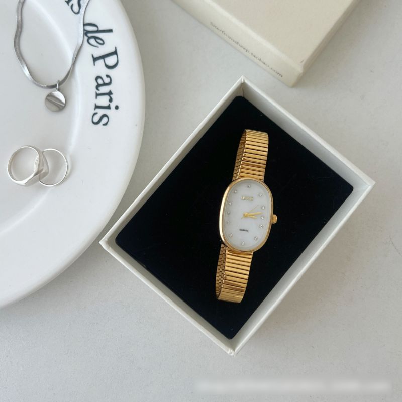 Fashion Gold Belt White Surface Stainless Steel Oval Dial Watch