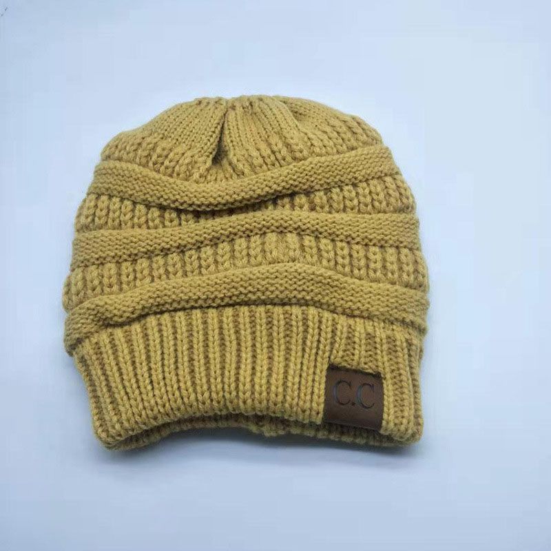 Fashion Yellow Solid Color Knitted Label Empty Top Beanie