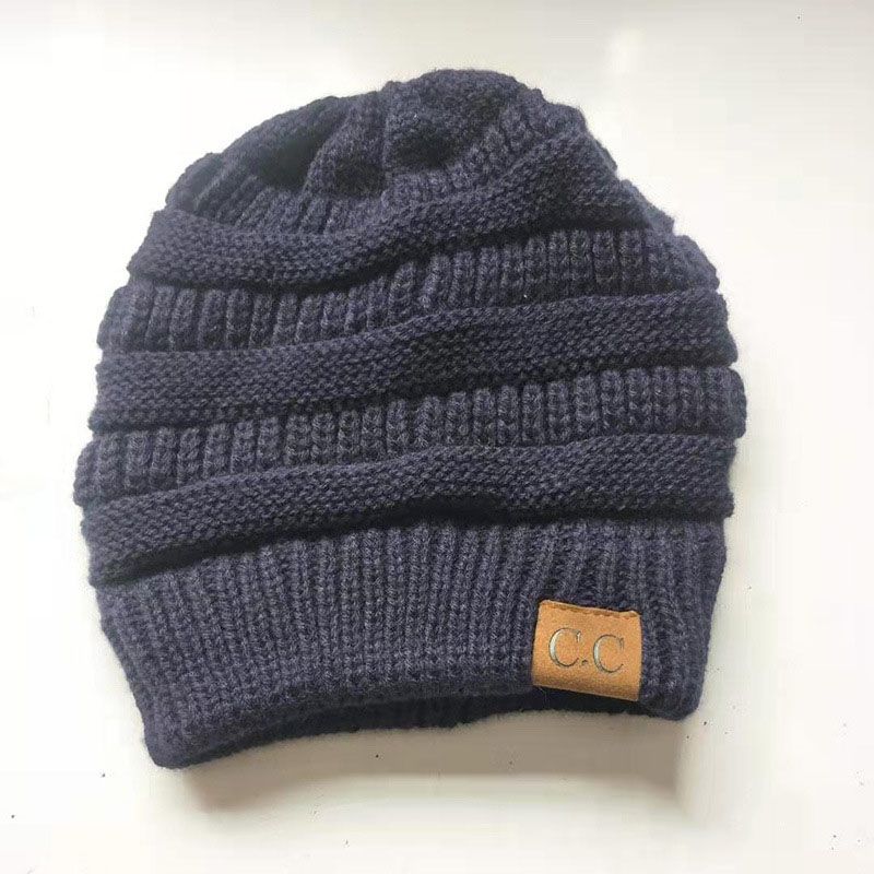 Fashion Navy Blue Solid Color Knitted Label Empty Top Beanie