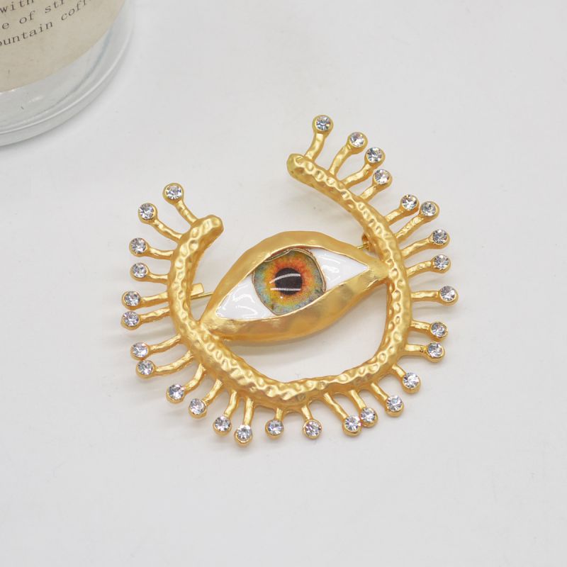 Fashion Gold Metal Diamond Eye Brooch