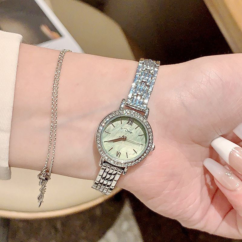 Fashion Green Face Titanium Steel Diamond Round Dial Watch (with Battery)