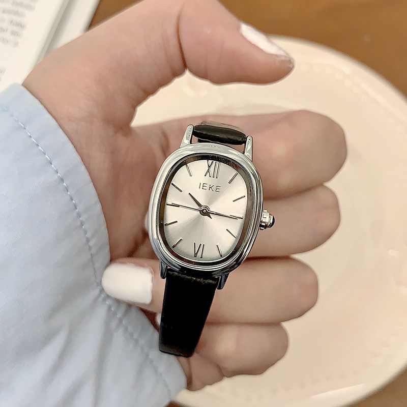 Fashion Black Belt Silver Frame White Surface Stainless Steel Oval Dial Watch (with Battery)