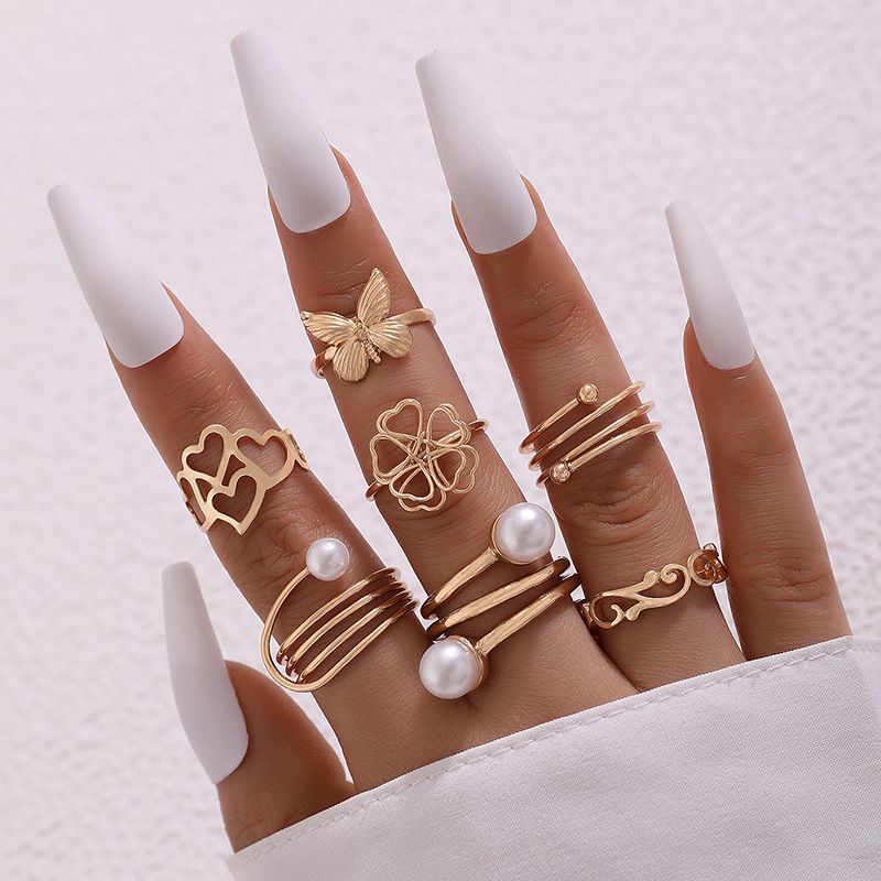 Fashion Gold Alloy Hollow Heart Flower Butterfly Pearl Ring Set
