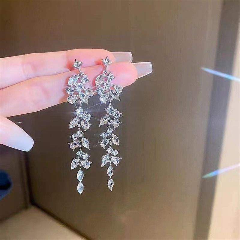 Fashion Silver Geometric Leaf Drop Earrings In Metal And Diamonds