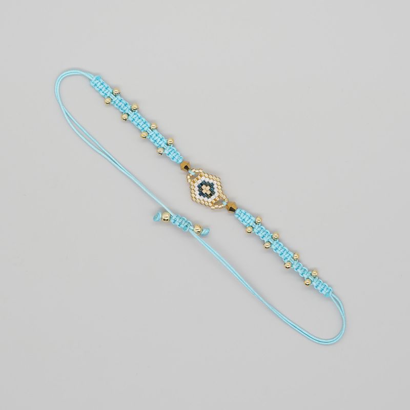Fashion Blue Rice Beads Braided Eye Bracelet