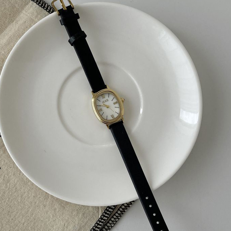 Fashion Black With Gold Frame And White Surface Oval Dial Leather Watch
