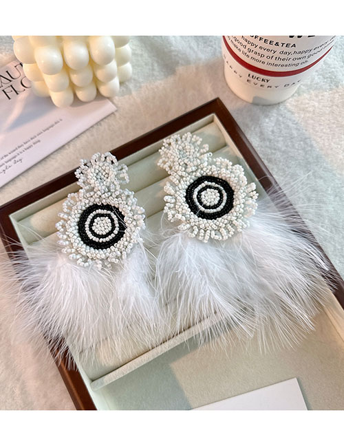 Fashion White Bead Braided Eye Tassel Earrings