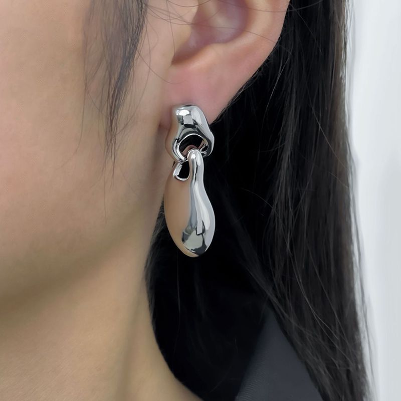 Fashion Silver Glossy Irregular Water Drop Earrings