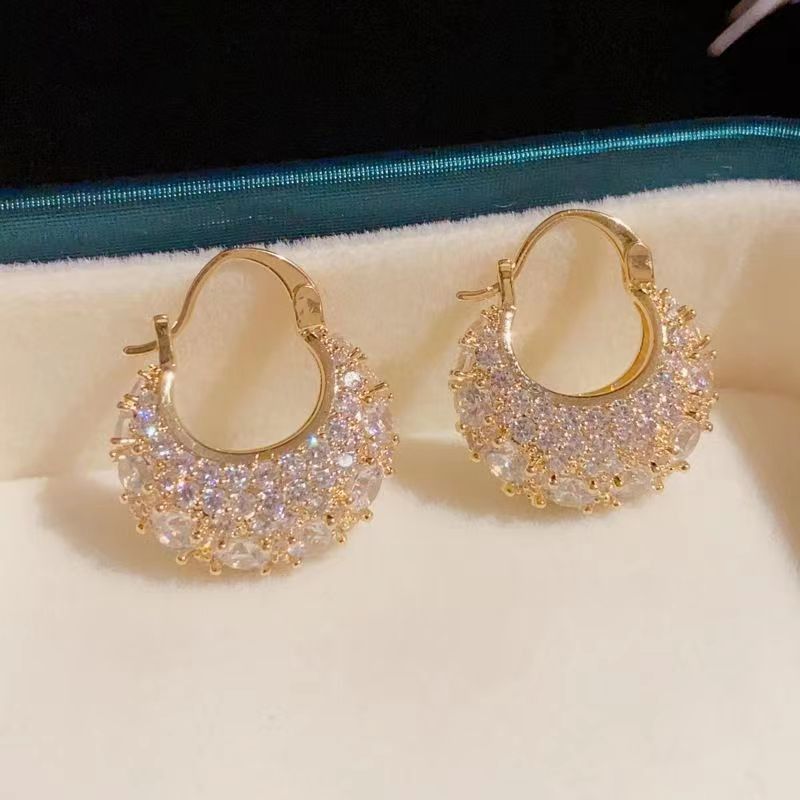 Fashion Gold Alloy Diamond Curved Earrings