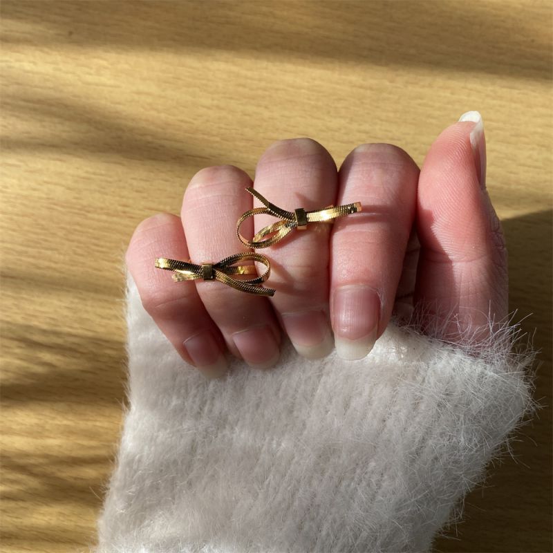 Fashion Gold Ring Titanium Steel Snake Bone Chain Bow Earrings
