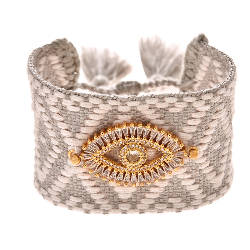 Fashion Light Grey Braided Tassel Bracelet With Copper Inlaid Zirconia Eyes Geometric Pattern