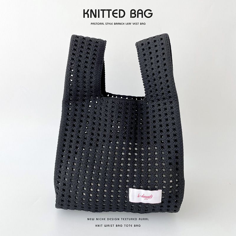 Fashion Black Solid Color Knitted Hollow Shoulder Bag