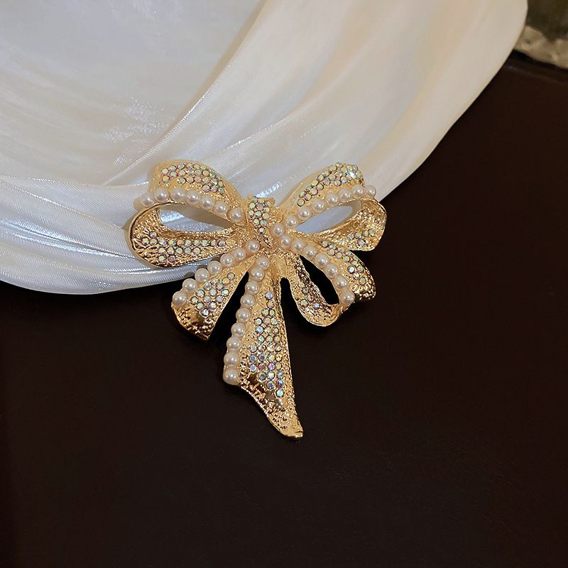 Fashion Brooch - Gold Metal Diamond And Pearl Bow Brooch