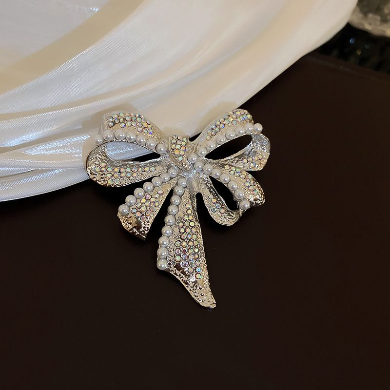 Fashion Brooch - Silver Metal Diamond And Pearl Bow Brooch