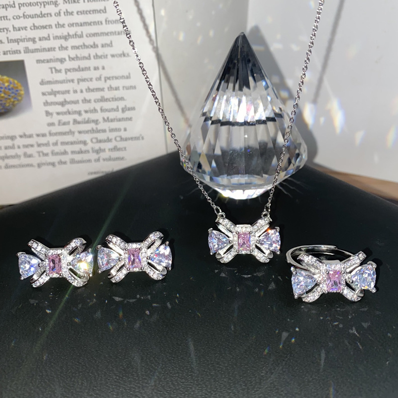 Fashion Pink Three-piece Set Copper Inlaid Zirconium Bow Stud Earrings Pendant Ring Set