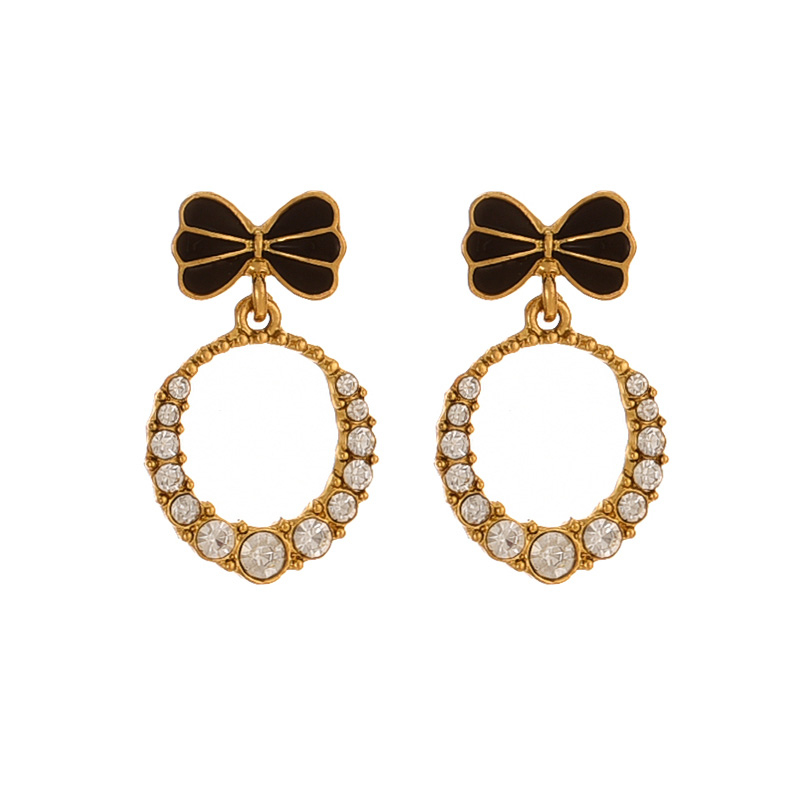 Fashion Gold Alloy Diamond Bow Earrings