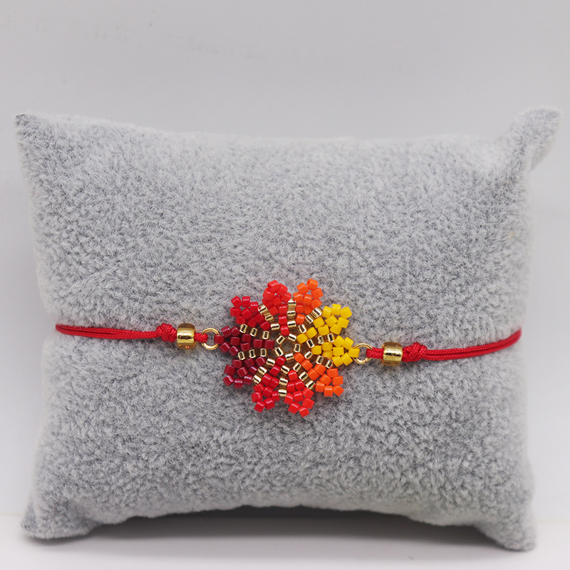 Fashion Red Rice Beads Woven Snowflake Bracelet