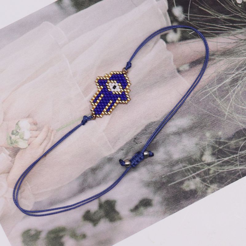 Fashion Navy Blue Rice Beads Braided Eye Palm Bracelet