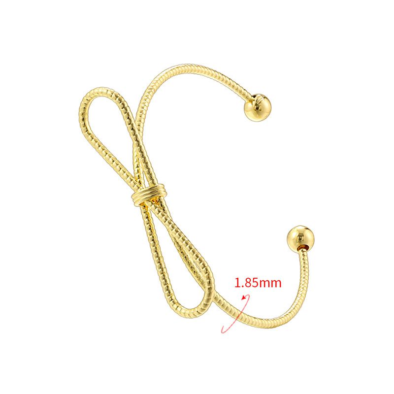 Fashion Gold Gold-plated Copper Glossy Twist Bow Bracelet