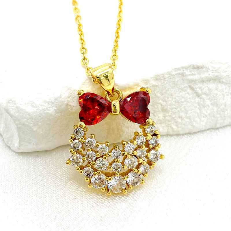 Fashion Gold Gold-plated Copper Bow Geometric Pendant With Diamonds