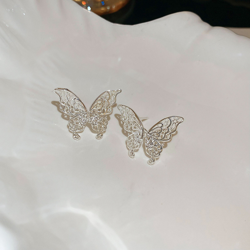 Fashion Silver Metal Butterfly Hollow Stud Earrings