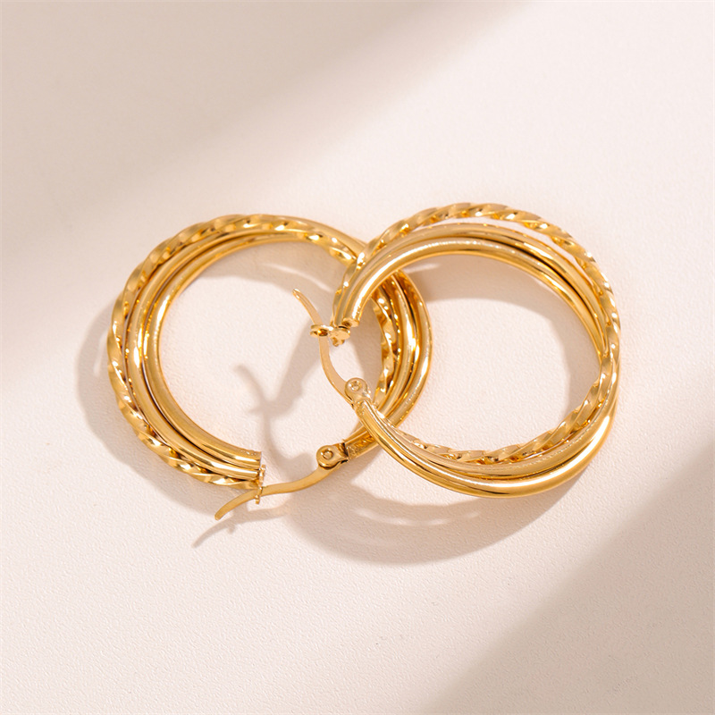 Fashion Gold Titanium Steel Twist Earrings