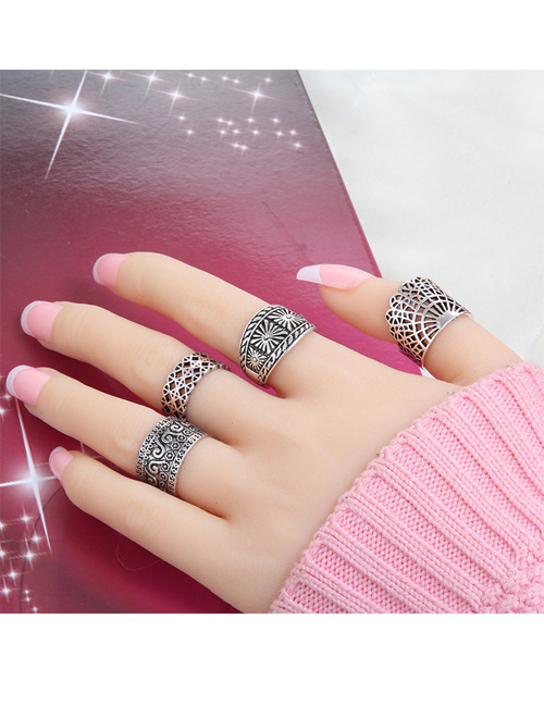 Fashion Silver Color Flower Pattern Decorated Pure Color Hollow Out Ring (4pcs)