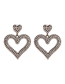 Pendientes Simétricos De Diamantes Con Corazón Perforado